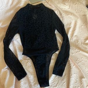 Beginning boutique. Black all mesh leopard thong body suit. Size 4